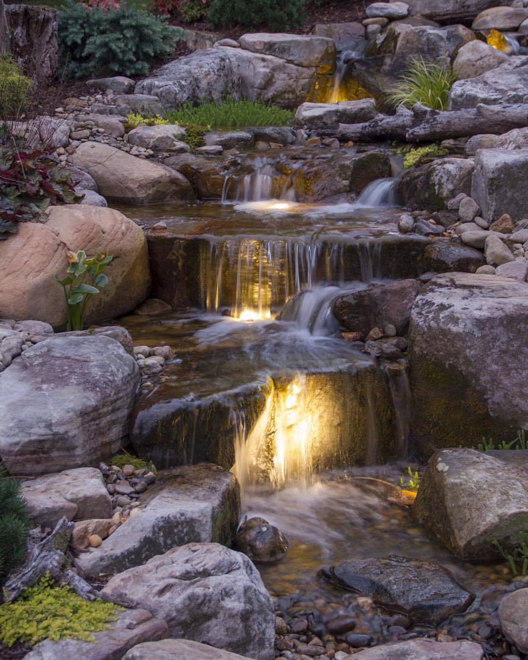 Backyard Waterfall in Redmond, Washington. Lighting and Repairs installed by Seattle Pond and Fountain