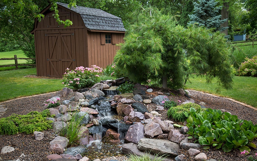 Beautiful water feature pond and fountain located in Issaquah, Washington. Monthly Maintenance provided by Seattle Pond and Fountain